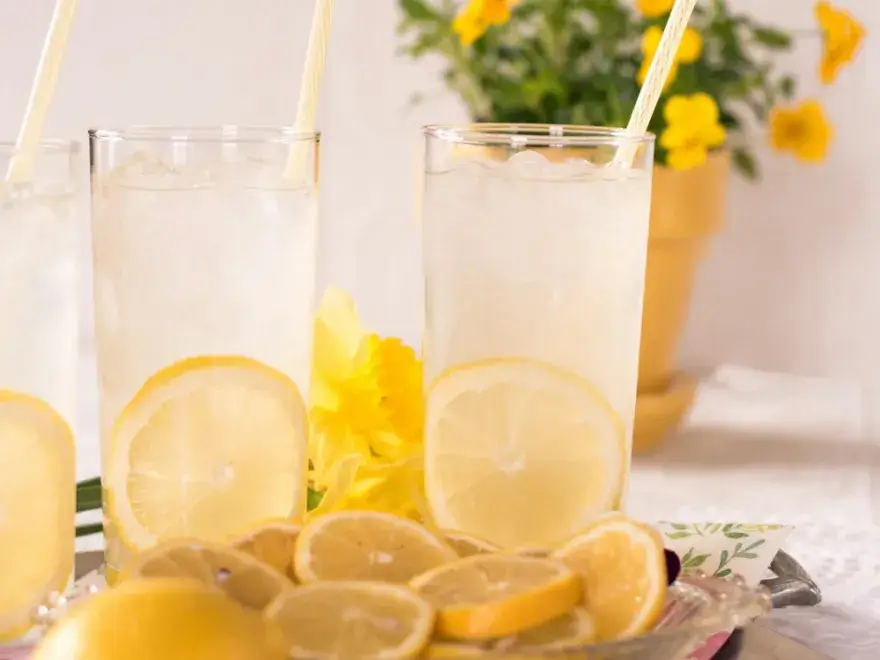 Glasses of lemonade with lemon slices